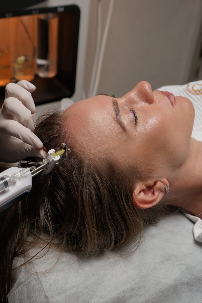 a girl takin hair loss treatment