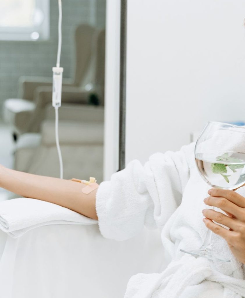 someone is taking iv drip treatment